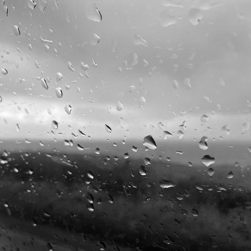 Coast through a rainy window
